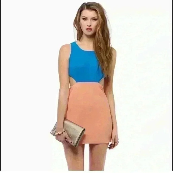 Tobi Dresses & Skirts - Tobi Boutique Cut Out Dress - worn once, size XS Color: Coral and Blue with zip